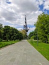 Moscow, Russia - May 31, 2021: Muzeon Art Park. Side view of the statue of Peter Great and the green park area. Vertical