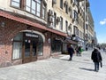 Moscow, Russia, May, 18, 2022. People walking near Khinkalnaya in house 28 on Krasnaya Presnya Street. Russia, the city of Moscow