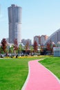 Pink running track in the park Khodynka field in Moscow