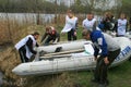 politician Sergei Mitrokhin carries a boat at the rally of the Yabloko party in defense of free access to the shore of