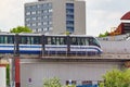 Moscow, Russia - May 12, 2019: Riding train of Moscow monorail against buildings in sunny day