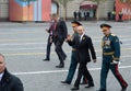 Russian President Vladimir Putin with defense Minister Sergei Shoigu and army General Oleg Salyukov during the celebration of the