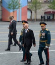 Russian President Vladimir Putin with defense Minister Sergei Shoigu and army General Oleg Salyukov during the celebration of the