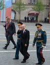 Russian President Vladimir Putin with defense Minister Sergei Shoigu and army General Oleg Salyukov during the celebration of the