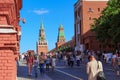 Moscow, Russia - May 27, 2018: Tourists follow the Kremlevskiy passage between State Historical Museum and Moscow Kremlin
