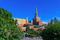 Moscow, Russia - May 27, 2018: Troitskaya tower of Moscow Kremlin in sunny evening. View from Alexandrovsky Garden Royalty Free Stock Photo