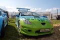 Moscow, Russia - May 25, 2019: Tuned car Toyota Celica T23 with airbrushing blue and green in the form of a flame. It is in the