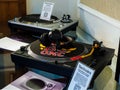 turntables and headphones of the Technics brand at the stand at the international exhibition `HI-FI