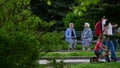 Moscow, Russia - May 15. 2018. Two grandmother talking while sitting on bench in park in Zelenograd