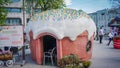Unusual house in the shape of a cake