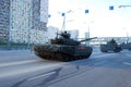 The Russian average main T-72B3 tank the `Pokrovsk` modification goes around the city.