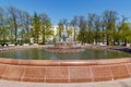 Moscow, Russia - May 01, 2019: View of Repinskiy fountain on Bolotnaya square in Moscow at sunny spring morning against trees and Royalty Free Stock Photo