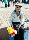 Moscow,Russia, May 9, 2018: war veteran of the Navy with medals and flowers presented