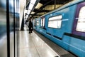 Moscow. Russia. September 26, 2020 Modern metro station at night. A lonely girl is waiting for the train