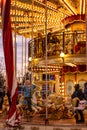 Moscow, Russia, 01/01/2020: New Year`s festive carousel with people rolling and having fun. Royalty Free Stock Photo