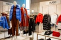 Moscow, Russia, November 2020: Corner of the Hugo Boss brand. Women`s fashion. Luxury brand. Mannequins are dressed in winter