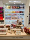 Moscow, Russia, November 2020: Corner of the Yankee candle brand in the megamall. Showcase with a variety of scented candles in