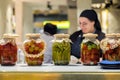Moscow. Russia. November 04, 2019: Glass jars of canned vegetables on the kitchen counter in a restaurant. Cook