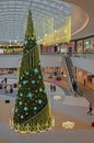 Moscow, Russia, November 19, 2019. A large elegant Christmas tree decorated with garlands and decorative elements in the Salaris Royalty Free Stock Photo