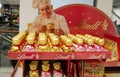 Lindt chocolate Teddy bears in gold foil and with a red heart pendant are sold in a supermarket