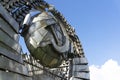 Moscow, Russia. Monument of USSR national soviet emblem made from metal on blue sky. Brutal USSR concept