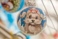 MOSCOW, RUSSIA - NOVEMBER 20, 2017: Museum of Christmas toys. Modern Christmas toys. Painting ball with cute cury dog