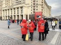 Moscow, Russia, November, 13, 2019. Organizers of bus tours in Moscow on Manezhnaya square Royalty Free Stock Photo