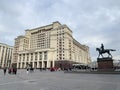 Moscow, Russia, November, 13, 2019. People walking near Four seasons premium hotel on Manezhnaya square in Moscow Royalty Free Stock Photo