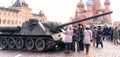 People watch retro tank world war ii on the Red Square
