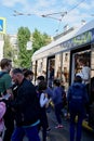 Moscow, Russia - November 2020 Photography of people at the the tram stop. People come in and out of streetcars They