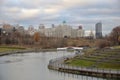 Moscow, Russia, November 16, 2021: Pond of Olympic Village Park and Michurinsky Prospect in autumn Royalty Free Stock Photo