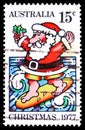 Postage stamp printed in Australia shows Surfing Santa, Christmas serie, circa 1977