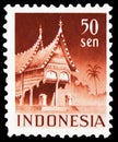 Postage stamp printed in Indonesia shows House with curved verges (Minangkabau style), West Sumatra, Building serie, circa 1949