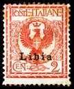 Postage stamp printed in Italy shows Eagle and ornaments, overprint Libia, Floreal serie, 2 Italian centesimo, circa 1901