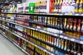 Moscow, Russia - November 17, 2019: Shelves with bottles of sparkling wine champagne. French red and white wine in a supermarket