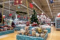 Moscow, Russia - November 20, 2020: Shopping malls have a New Year sale. Decorated Christmas trees are installed in the halls Royalty Free Stock Photo