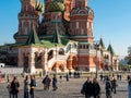 Moscow, Russia - October 5, 2021: Cathedral of St. Basil the Blessed against the blue sky. People walk along Red Square Royalty Free Stock Photo