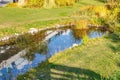 Moscow, Russia - October 08, 2019: Decorative pond in Zaryadye Park at sunny autumn day. Zaryadye Park is a popular holiday