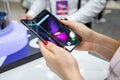 Moscow, Russia - October 04, 2019: female hands holding a new flagship smartphone Samsung Galaxy Fold with flexible display. Royalty Free Stock Photo