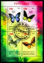 Four postage stamps printed on Ivory Coast from the Butterflies serie, circa 2013