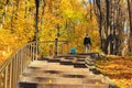 Moscow, Russia - October 17, 2018: Granite staircase with stainless steel railing in Tsaritsyno park in Moscow on a background of