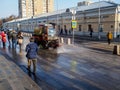 Machine disinfection of pedestrian areas and sidewalks in the city. The use of disinfectants in public places