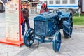 Moscow, Russia - October 08, 2019: Men near restored american wheel tractor FORDSON F on the exhibition of agricultural machinery Royalty Free Stock Photo