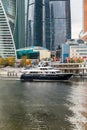 MOSCOW, RUSSIA - OCTOBER 24, 2017: Modern business class pleasure boat next to the wharf of Moscow International Business Centre. Royalty Free Stock Photo