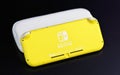 MOSCOW, RUSSIA - October 08, 2019: Nintendo Switch Lite is Nintendo`s latest entry into handheld gaming. Priced at $199.99