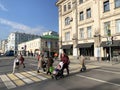 Moscow, Russia, October, 16, 2019. People crossing the road on pedestrian crossing in front of the house 19 on Pokrovka street. Ap