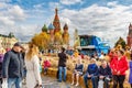 Moscow, Russia - October 05, 2019: People resting on the benches made of straw on Red Square in Moscow. Decorative installations