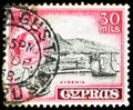 Postage stamp printed in Cyprus shows Queen Elizabeth II and Kyrenia Harbor, Definitive Issues serie, circa 1955