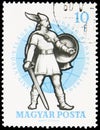 Postage stamp printed in Hungary shows Combatant of the 10th Century, World Fencing Championships, Budapest serie, 10 Hungarian