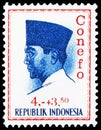 Postage stamp printed in Indonesia shows President Sukarno, Conference of New Emerging Forces, Djakarta serie, circa 1965 Royalty Free Stock Photo